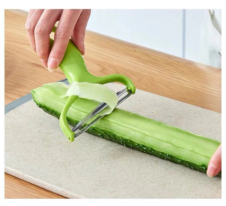 "Slice, grate, and peel with precision—your ultimate kitchen companion for veggies and fruits! 🥔🥕🔪