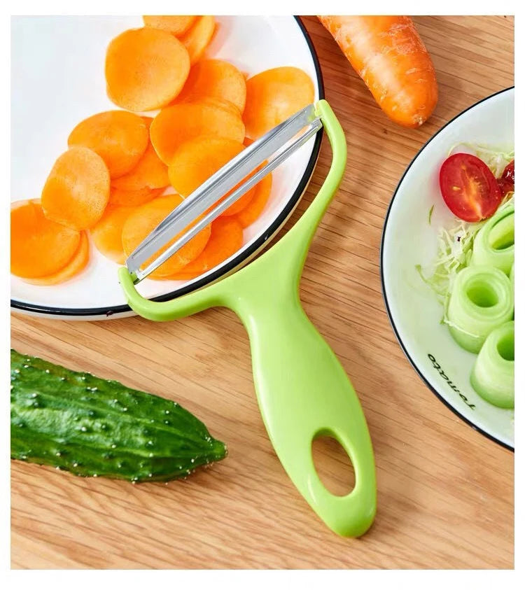 "Slice, grate, and peel with precision—your ultimate kitchen companion for veggies and fruits! 🥔🥕🔪